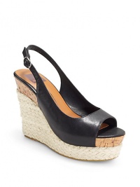 THE LOOKPeep toeAdjustable slingback strapPadded insoleCork and espadrille wedge, 4½ (115mm)Cork and espadrille platform, 1½ (40mm)Compares to a 3 heel(75mm)THE MATERIALLeather upperLeather liningRubber soleORIGINImported