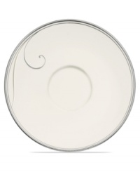 Fluid platinum scrolls glide freely throughout this beautiful fine china saucer from Noritake. Easy to match with any decor, the fresh and elegant Platinum Wave collection of dinnerware and dishes is a timeless look for fine dining or luxurious everyday meals.