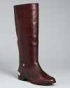 These riding boots are emboldened with golden trim, ready for stepping out stylishly 24/7; from Cynthia Vincent.