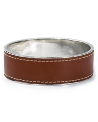 Lauren Ralph Lauren's topstitched leather bangle lends a rugged, western edge to your look. Pair it with dark denim or a peasant skirt for prairie-pretty style.