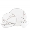 Hummingbirds twirl and buzz from pink leaves to blue on these dreamy bone china place settings from Lenox Lifestyle dinnerware. The dishes from the Silver Song collection are crisscrossed with platinum branches and abound with fanciful springtime delight and irresistible modern charm. (Clearance)