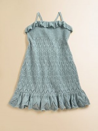 Intricately knit in a delicate pointelle pattern, this adorable linen dress boasts ruffled trim and a peplum hem for a sweet, girlie finish.Straight, ruffled necklineSpaghetti straps form a racerbackPull-on stylingRuffled hemLinenShell: 95% silk/5% elastaneDry cleanImported