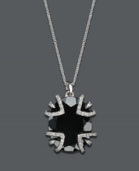 Express yourself with statement-making style. This bold pendant features a large onyx gemstone (12-1/3 ct. t.w.) accented by a diamond dusted (1/10 ct. t.w.) prong setting. Crafted in sterling silver. Approximate length: 18 inches. Approximate drop: 3/4 inch.