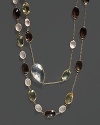 A mix of colorful quartz and clear crystal stations on a 14K yellow gold chain.