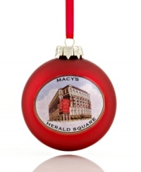 An iconic New York City landmark, Macy's Herald Square is displayed in all its glory on this matte glass ornament from Kurt Adler.