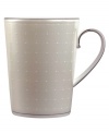 Wake up to fresh, luminous style with this fine china mug. From innovative designer Monique Lhullier, it features a pearlescent border with glossy raised dots and a fine stitch-like pattern.