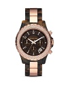 An ultra-stylish timepiece from MICHAEL Michael Kors with crystal-embellished bezel and tortoise and rose gold tone bracelet.