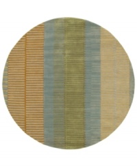 Add urban flair to your pad with Surya's contemporary rug from the Artist Studio collection. Muted yellow, sage green and rust tones are styled in a grid motif against the slate grey background for a low-key, hip result. Crafted from dense wool pile, the Artist Studio rug offers a uniquely textured feel that is incredibly soft to the touch.