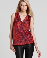 Zebra print takes on vibrant color in this elegantly draped Rachel Zoe top in lustrous silk.