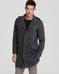 From the hood to the herringbone print, this long coat from Theory brings layers of depth to your style.