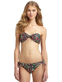 THE LOOKAbstract print with metallic touchesBandeau top gathered by a center knotPadded cups with side boningBack clasp closureTHE MATERIAL80% nylon/20% spandexFully linedCARE & ORIGINHand washImportedPlease note: Bikini bottom sold separately. 