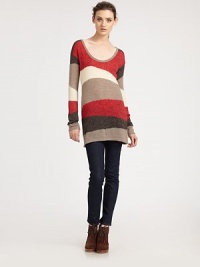 Overwhelmingly soft sweater tunic with dropped shoulders and a graphically charged colorblock pattern. ScoopneckDropped shouldersLong sleevesAbout 33 from shoulder to hem40% acrylic/33% nylon/20% mohair/7% woolDry cleanImportedModel shown is 5'10 (177cm) wearing US size Small.