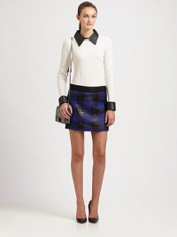 Ribbon-like pattern reinvents this fashion-daring plaid mini skirt. Elastic waistbandSide zipperAbout 18 long85% acrylic/15% woolDry cleanMade in USA of French fabricModel shown is 5'10 (177cm) wearing US size 4.