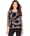 Alfani's petite sweater looks especially sleek with a graphic intarsia at the front and a flattering fit.