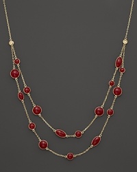 Two rows of bright red enamel stations and diamond accents highlight this collar necklace from Roberto Coin.