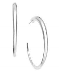 The perfect complement to any look, these polished, three-quarter hoop earrings add a much-needed touch of shine. Set in sterling silver. Approximate diameter: 2 inches.