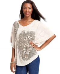 Step out in Style&co.'s fashionable top! Short dolman sleeves and dazzling studs make this the perfect top to pair with your favorite jeans.