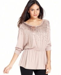 Dress up your everyday with this top from Grace Elements.