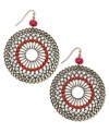 Add a little embellishment to your classic collection. INC International Concepts pretties up intricate filigree detail with coral plastic stones and pink crystal accents on these distressed brass oxidized-plated circle earrings. Crafted in mixed metal. Approximate drop: 2-3/4 inches.