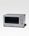 A classic approach to modern cooking combines a toaster oven, convection oven and broiler. Industrial styling and convenient keep-warm function make this multi-functional countertop oven a valuable addition to any kitchen.0.6 cu.