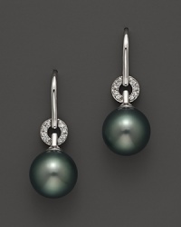 A timeless classic, these Tara Pearls earrings combine 18K white gold with Tahitian black pearls, detailed with sparkling diamond accents.