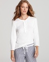 Lauren Ralph Lauren adds a feminine touch to this classic lounge top with a front ruffle and three-quarter sleeves.