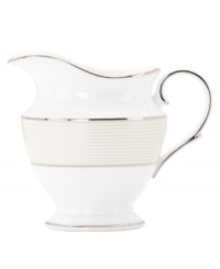 Modern yet timeless, this fine china creamer is sure to satisfy the style-hungry host. From Lenox dinnerware, the dishes from the Opal Innocence Stripe collection are simply dressed in cream and white stripes and finished with a polished platinum trim, creating an ultra-chic setting to enjoy celebratory meals.