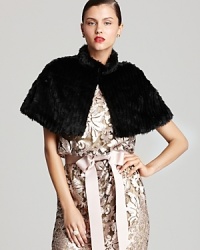 In plush faux fur, a luxe Sue Wong wrap lends a glamorous layer to chilly evenings.