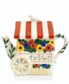 Turn afternoon tea into a garden party with the colorful Patio Garden teapot, featuring whimsical detail from the striped awning lid to brilliant blooms. A fun gift for tea drinkers from Tabletops Unlimited.