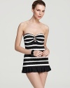 In flamestitched, zig-zag stripes, this La Blanca skirted one-piece lends high style in a classic black and white colorway.