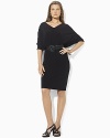 Designed for a flowing silhouette from figure-flattering stretch matte jersey, this dress features slimming ruched dolman sleeves, a V-neckline and a versatile braided leather belt for a stylish silhouette.