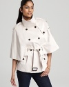 Bring essential chic to your spring looks with this trench-style cape from Marc New York.