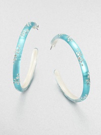 From the Lucite Wanderlust Collection. Slender hoops of hand-painted, hand-sculpted Lucite, sprinkled with the shimmer of Swarovski crystals.CrystalLuciteDiameter, about 2Post backMade in USA