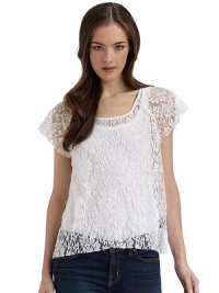 THE LOOKOpen weave lace designRound necklineShort sleeves with unfinished cuffsUnfinished hemTHE FITAbout 23 from shoulder to hemTHE MATERIALCotton/nylonCARE & ORIGINMachine washMade in USAModel shown is 5'9 (175cm) wearing US size Small. 