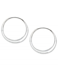 Double your pleasure with these hoop earrings from Robert Lee Morris. Crafted from silver-tone mixed metal, the pair features a hammered look for a classic approach. Approximate drop: 2-1/5 inches.