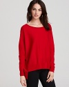 A alluring ballet neck accents an asymmetrical Eileen Fisher top for an effortless balance between elegance and edge.