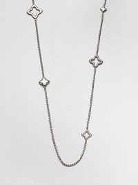 A long graceful box chain of sterling silver is dotted with an array of shapely quatrefoil charms in open, solid and cable styles, adding character and understated elegance.Sterling silverLength, about 36Lobster clasp closureImported