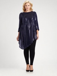 This silk top with allover sequins will move with you as its draped, asymmetrical hem provides a flattering and feminine silhouette.BoatneckThree-quarter sleevesAsymmetrical hemAllover sequinsConcealed back zipperFully linedAbout 35 from shoulder to hemSilkDry cleanImported