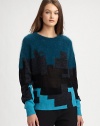 Mesh paneling and a graphic, colorblocked pattern modernize this plush sweater. RoundneckLong sleevesRibbed cuffs and hem37% wool/30% viscose/23% angora/10% polyamideDry cleanImportedModel shown is 5'10 (177cm) wearing US size Small.