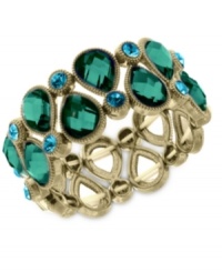 Make a colorful splash with this stretch bracelet from 2028. Crafted from gold-tone mixed metal, the bracelet features green glass and blue zircon beads for a stunning effect. Approximate diameter: 2-1/2 inches.