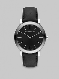 A super-slim black dial with sapphire crystal detail on a smooth leather strap. Round bezel Quartz movement Water resistant to 3 ATM Stainless steel case: 40mm (1.57) Leather strap: 20mm (0.79) Made in Switzerland 