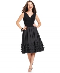 A ruched bodice and ribbon embellishments at the skirt make this petite SL Fashions dress as full of fun as it is filled with dashing design details. (Clearance)