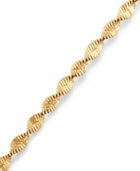 The perfect twist. Giani Bernini's versatile bracelet features elegant swirls of 24k gold over sterling silver. Approximate length: 7-1/2 inches.