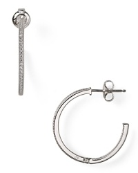 With a crystal-encrusted rim, Chrislu's sterling silver hoop earrings are a classic choice whether worn with denim or more swank with a little black dress and heels.