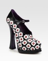 A flower appliqué adorns this leather platform Mary Jane style with an adjustable ankle strap. Self-covered heel, 5½ (140mm)Covered platform, 1¾ (45mm)Compares to a 3¾ heel (95mm)Leather upperAdjustable ankle strapLeather liningLeather and rubber solePadded insoleMade in ItalyThis style runs small. We recommend ordering one half size up for a standard fit. 