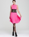 Pretty pink pleats meet a contrast cutout waist in a BCBGMAXAZRIA dress that's one cut above the rest.