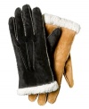 Heavy duty construction and delicate details. Contrast stitching feminizes these thickly-lined suede gloves by Isotoner.