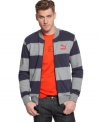 Sporty bar stripes elevate this Puma jacket from workout gear to street style. (Clearance)