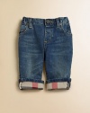 Soft, faded denim in a perfectly detailed miniature version of grown-up jeans, with Burberry checks lining the cuffs.Back elastic waistband with belt loopsZip fly with button closeFront scoop pockets and coin pocket with rivetsBack patch pockets98% cotton/2% elastaneMachine washImported