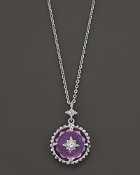 A delicate, feminine pendant on a sterling silver chain in purple crystal with white sapphire accents.